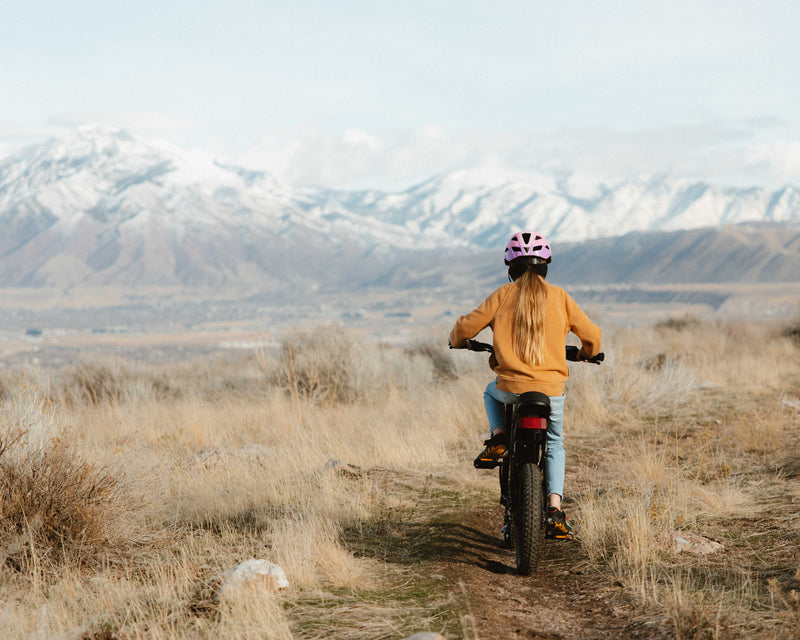 Ride an electric bike on a dirt road