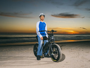 Macfox X1S black electric bike in a lifestyle photo.