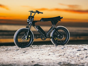 Macfox X1S black electric bike in a lifestyle photo.