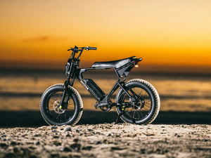 Macfox X1S black electric bike in a lifestyle photo.
