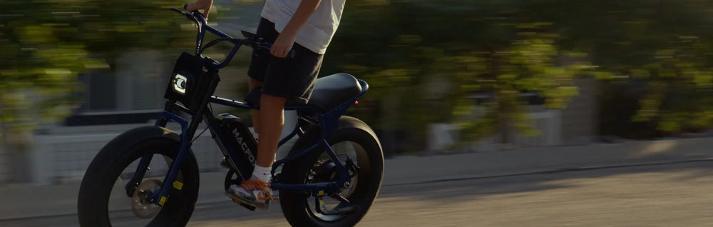 The boy was riding a Macfox X7 Electric Cruiser Bike​