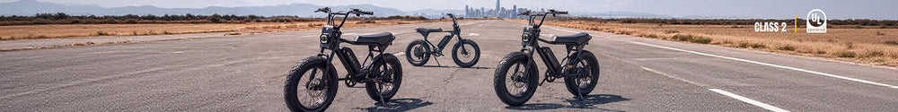 Three Macfox X1S, X2 Pro, and X7 street-legal eBikes are parked together on an open runway.